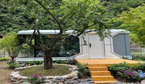 Capsule House — Rooftop Capsule Suite